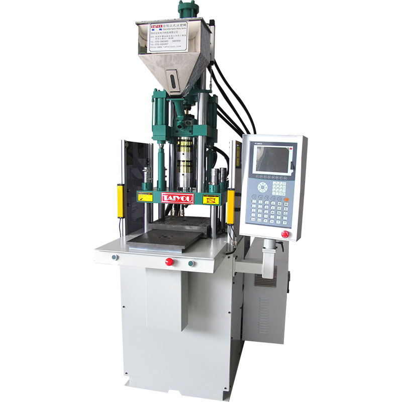 Slide plate vertical injection molding machine