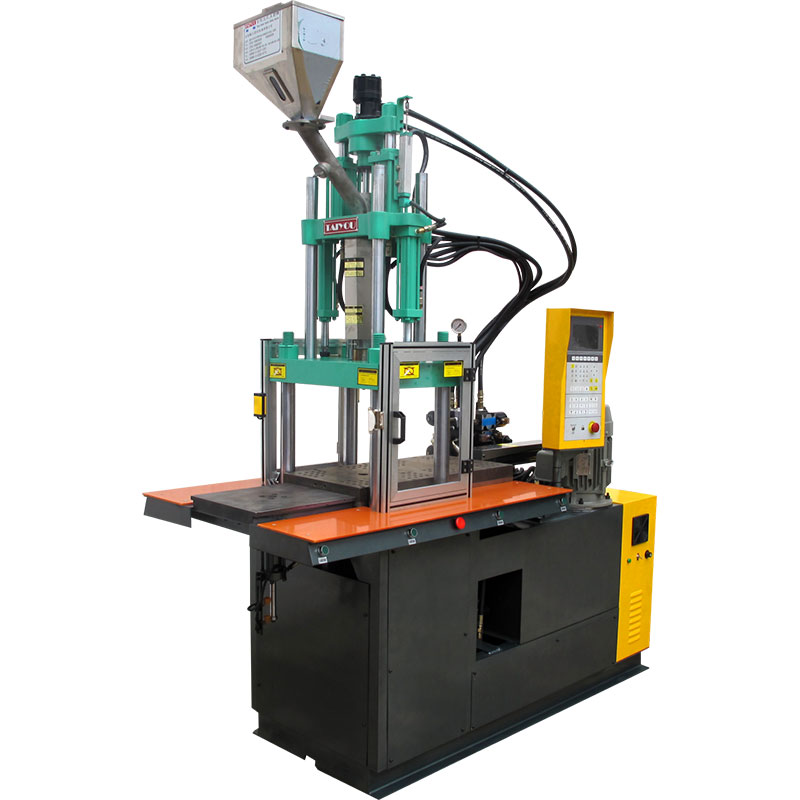 Slide plate vertical injection molding machine